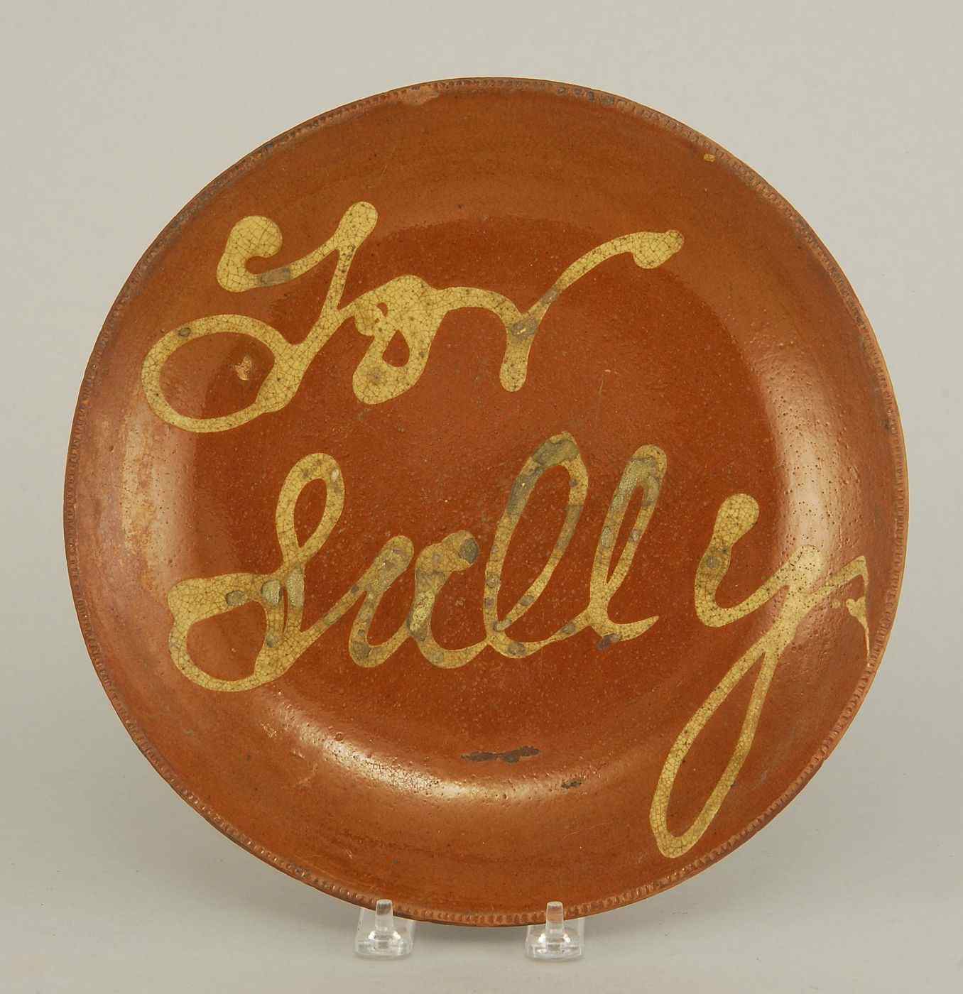 Appraisal: ANTIQUE AMERICAN EARTHENWARE PLATE th CenturyFor Sally'' with yellow slip