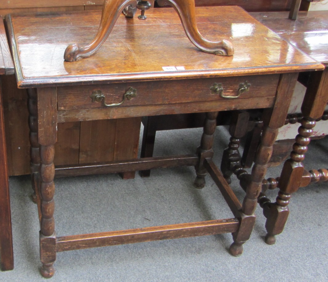 Appraisal: A th century Charles II style single drawer oak side