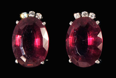 Appraisal: Pink tourmaline diamond earrings pair each set with oval faceted