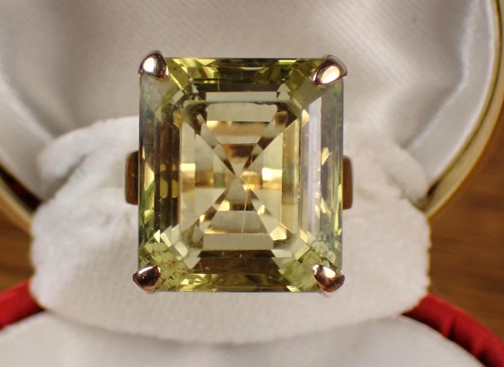 Appraisal: LEMON QUARTZ AND FOURTEEN KARAT GOLD SOLITAIRE RING with four