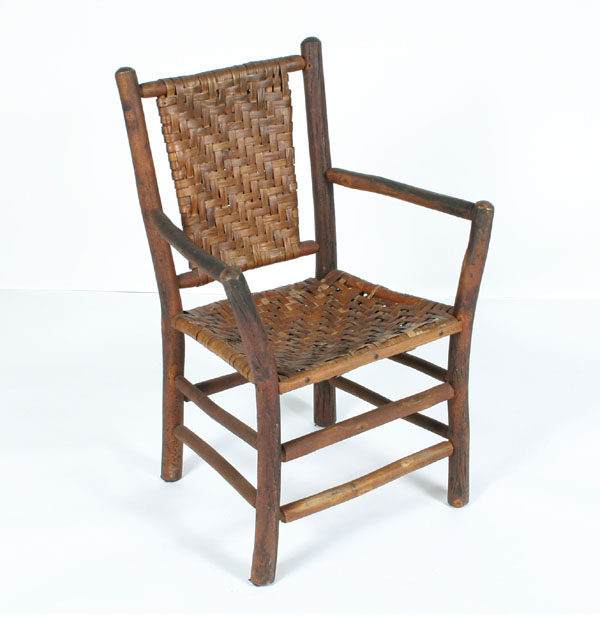 Appraisal: Old hickory arm chair woven seat and back H x