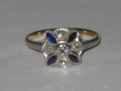 Appraisal: AN ART DECO STYLE SAPPHIRE AND DIAMOND RING modelled as