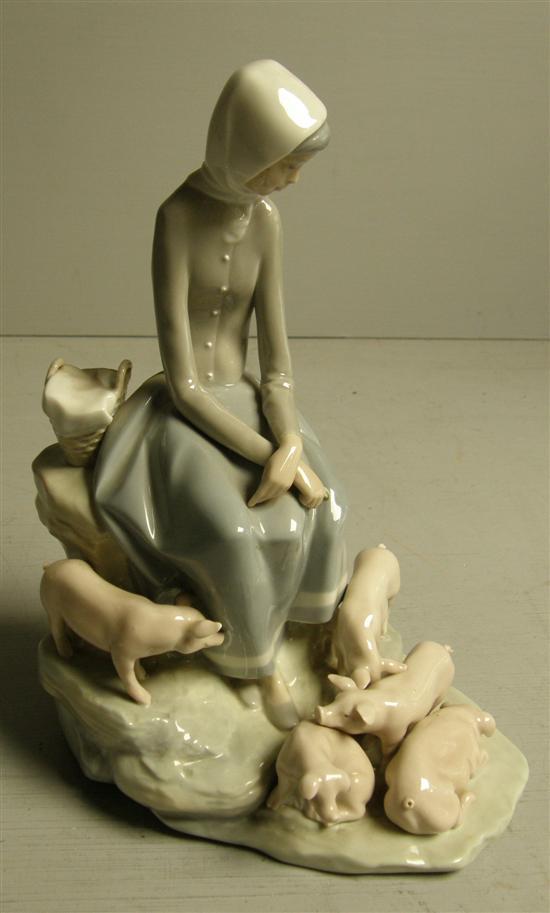 Appraisal: Lladro group of girl with piglets h in