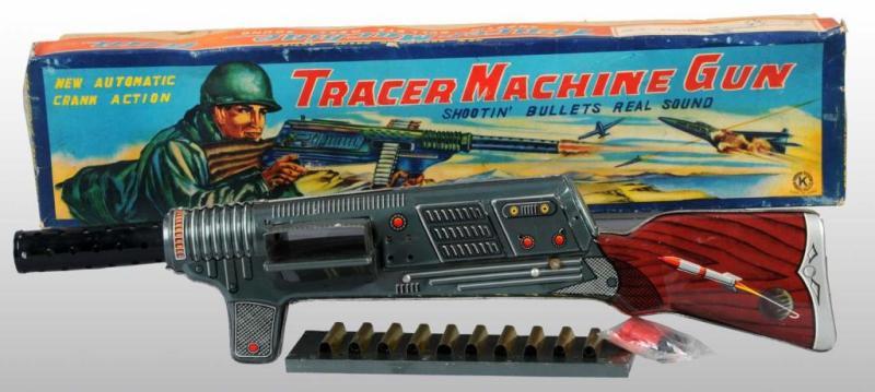 Appraisal: Lot of Japanese Tracer Machine Gun Toys Description Includes original