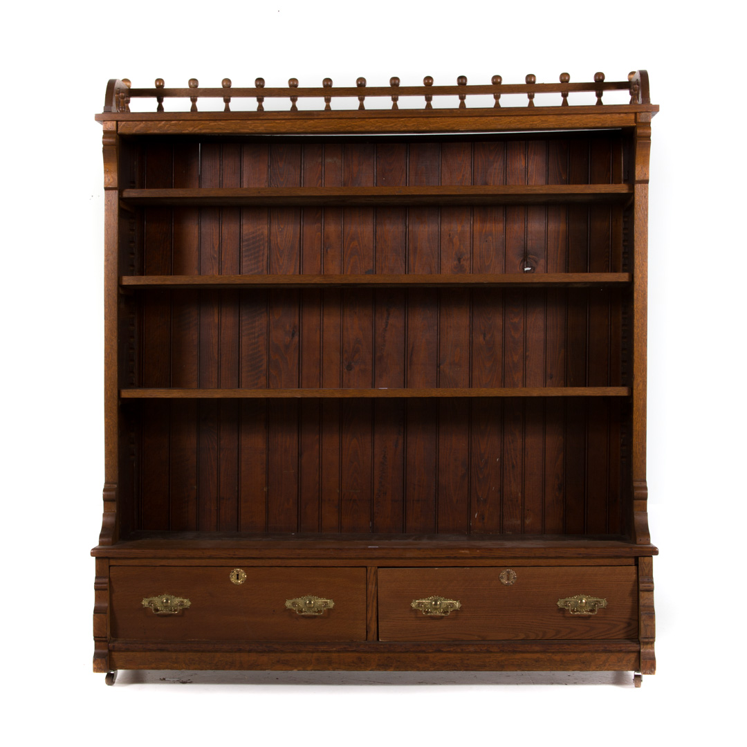 Appraisal: Victorian Eastlake oak bookcase late th century in spindled gallery