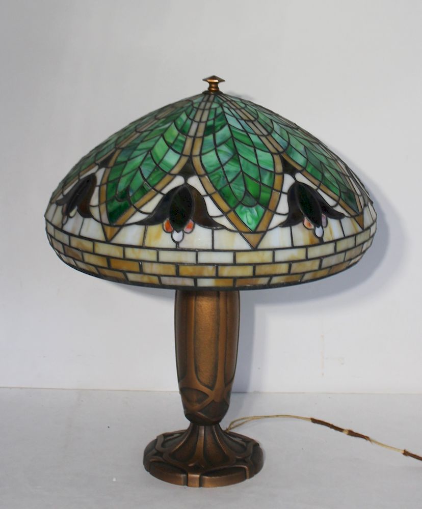 Appraisal: BRADLEY HUBBARD Gilt Metal Table Lamp And Leaded Shade The