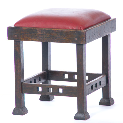 Appraisal: PRAIRIE SCHOOL Footstool with drop-in tacked-on decking covered in red