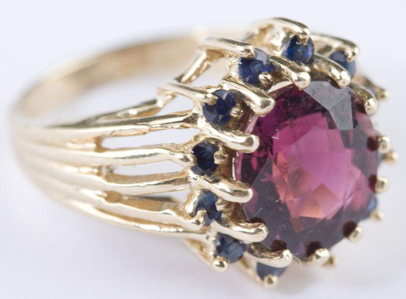 Appraisal: KT Yellow Gold Tourmaline and Sapphire Ring with one oval