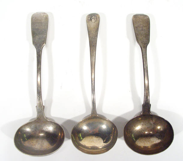 Appraisal: Two Georgian silver sauce ladles and a plated sauce ladle