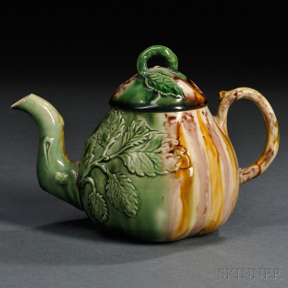 Appraisal: Staffordshire Cream-colored Apple-form Teapot and Cover England c molded crabstock