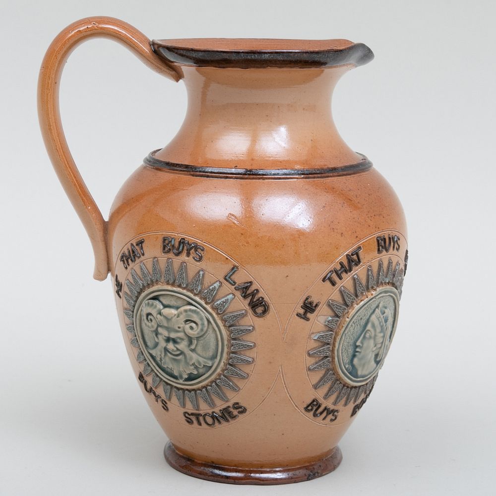 Appraisal: Royal Doulton Mottoware Jug Impressed marks decorated 'he that buys