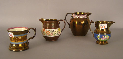 Appraisal: Three copper luster creamers together with a mug th c