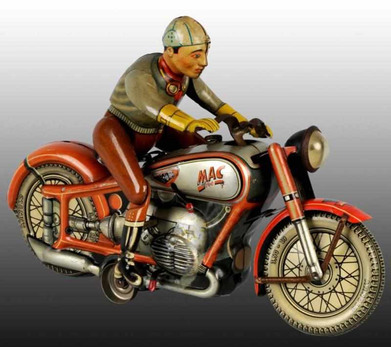 Appraisal: Tin Arnold Mac Motorcycle Wind-Up Toy Description German Working Marked