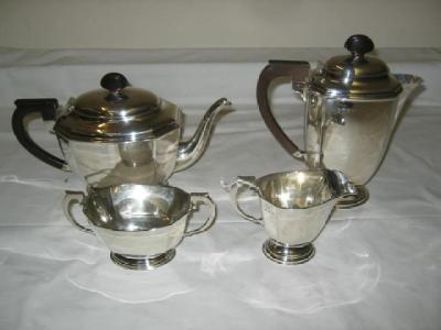 Appraisal: A FOUR PIECE TEA AND COFFEE SET of canted oblong