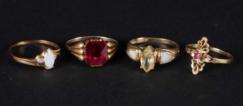 Appraisal: Lot of Gold Rings Description Includes one with opal and