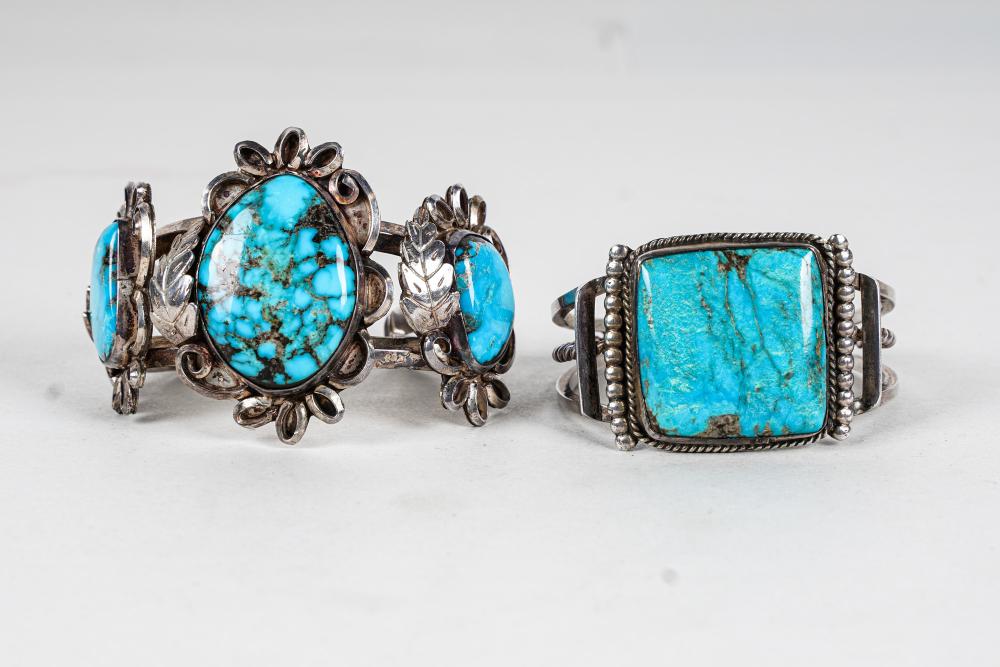 Appraisal: TWO SILVER TURQUOISE CUFF BRACELETSone cuff containg one cushion cabochon