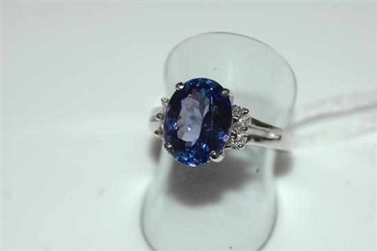 Appraisal: A TANZANITE AND DIAMOND DRESS RING IN CT WHITE GOLD