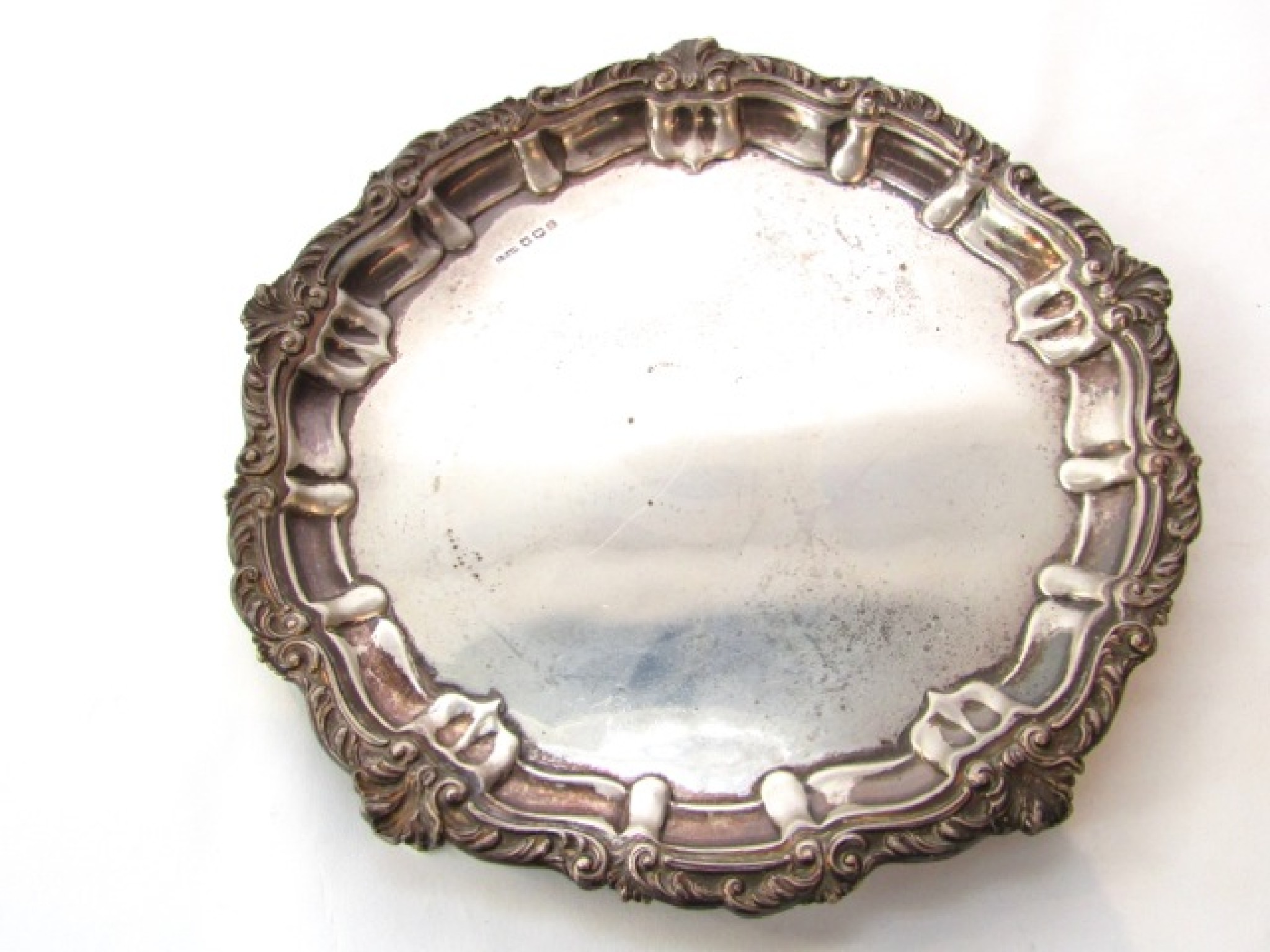 Appraisal: A silver salver Stone Brothers Jewellers Ltd Sheffield of circular