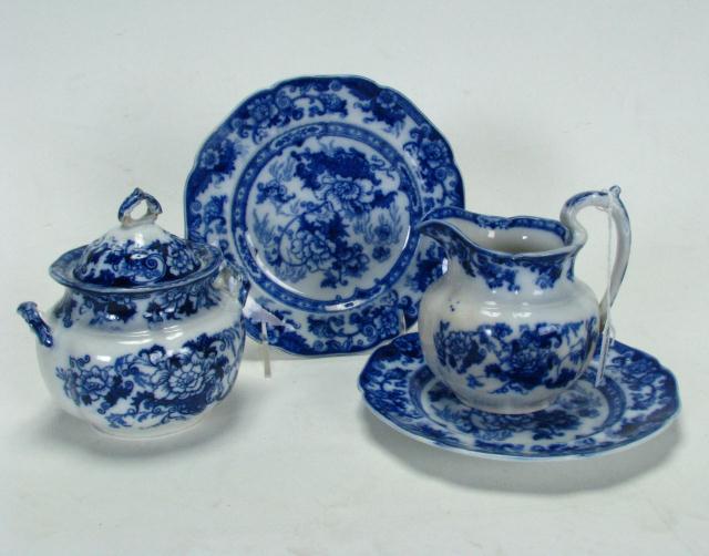 Appraisal: Group of Flow Blue Porcelain Items including Cauldon creamer and