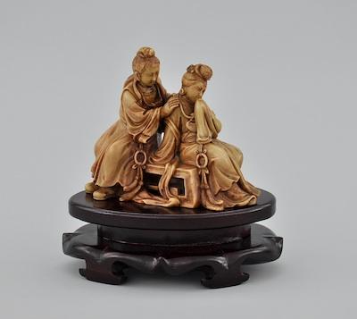 Appraisal: A Finely Carved Soapstone Figural Depicts two figures seated on