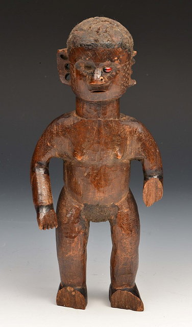 Appraisal: AN EAST AFRICAN MAKONDE CARVED WOODEN FEMALE FIGURE with single