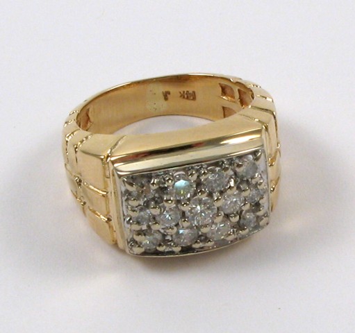 Appraisal: DIAMOND AND FOURTEEN KARAT GOLD RING set with round-cut diamonds