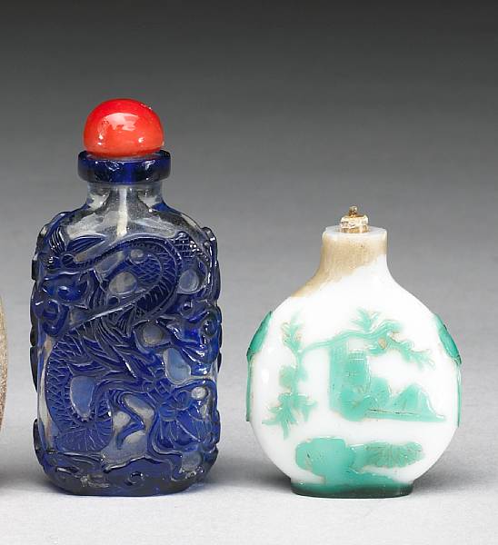 Appraisal: Two overlay glass snuff bottles th Century The first a