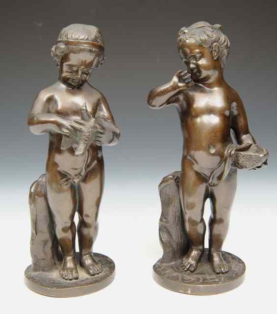 Appraisal: A PAIR OF TH CENTURY FRENCH BRONZE FIGURES OF CHILDREN