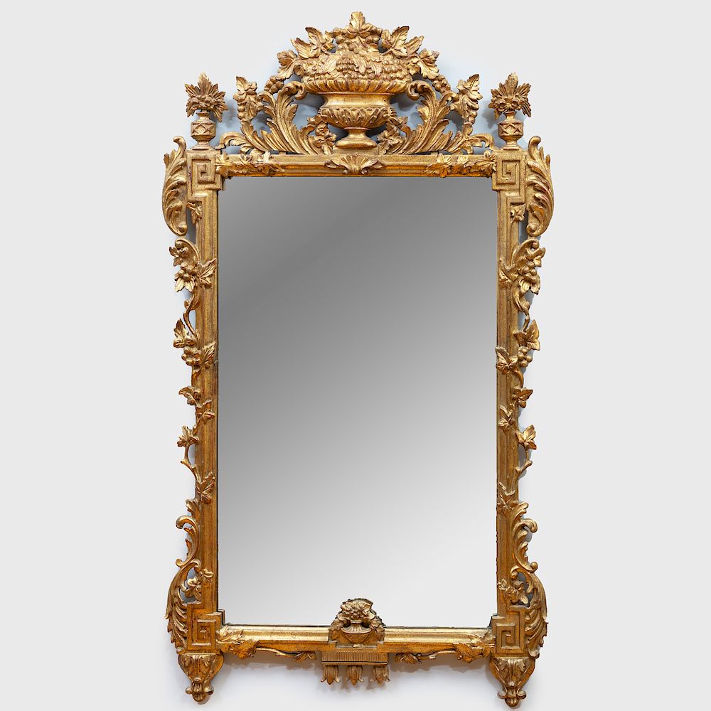 Appraisal: Louis XVI Style Giltwood Mirror Surmounted by a flower-filled urn