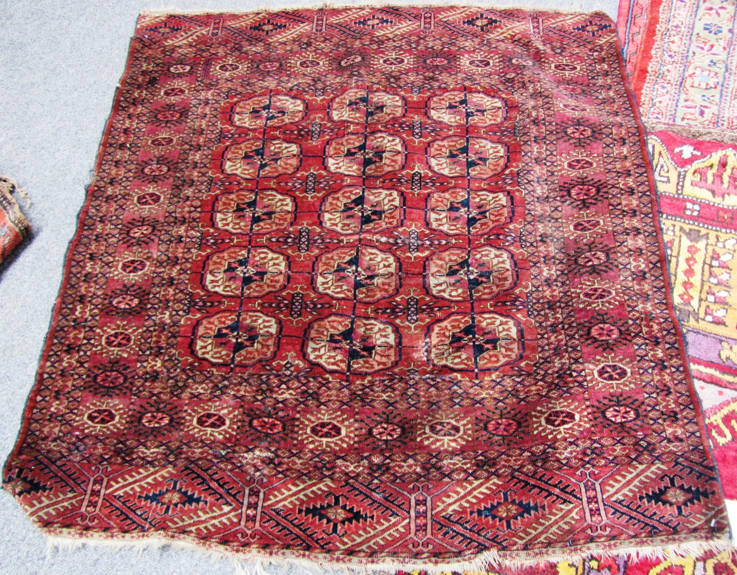 Appraisal: A Tekke Turkman rug the madder field with three columns