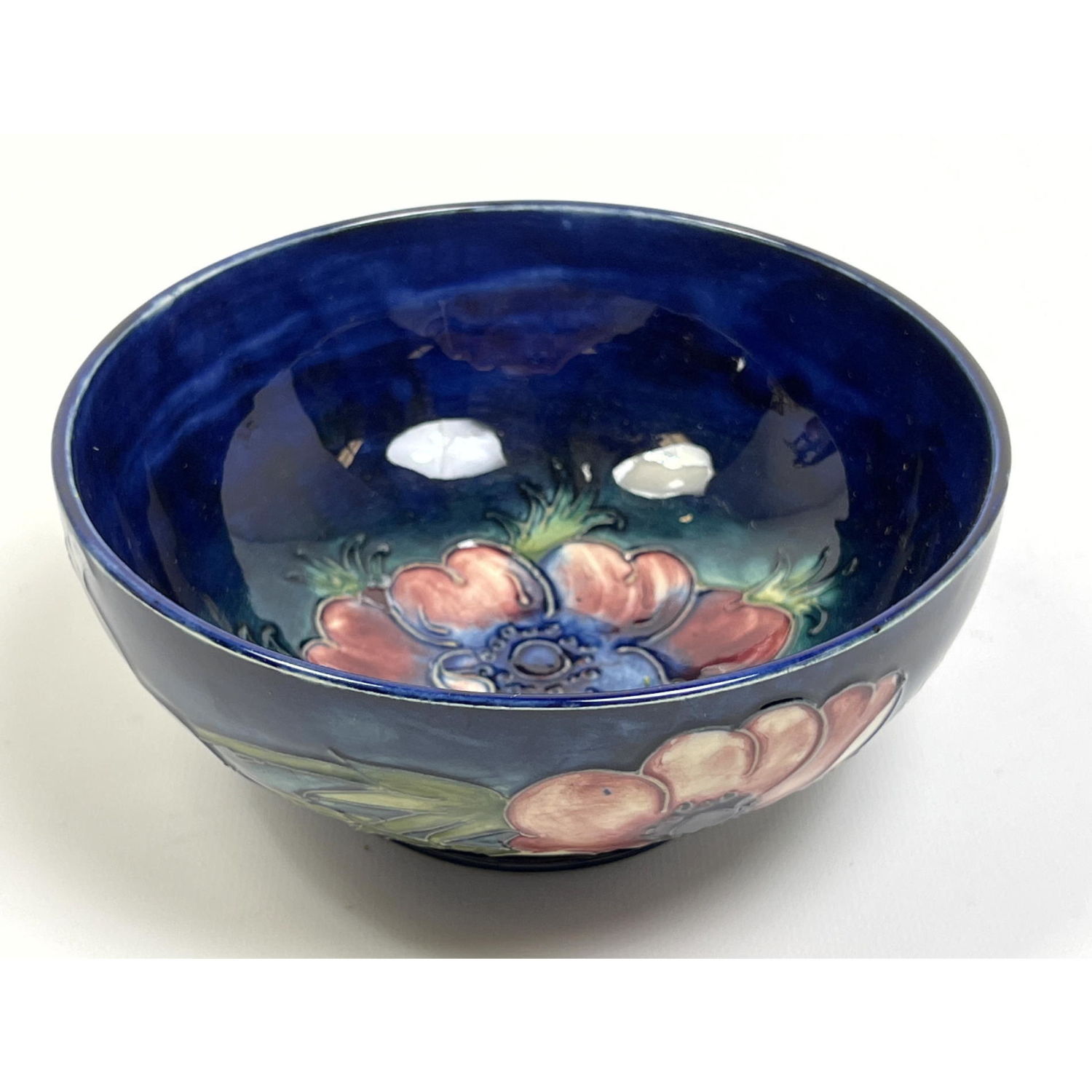 Appraisal: MOORCROFT English Art Pottery Bowl Poppy flowers on rich cobalt