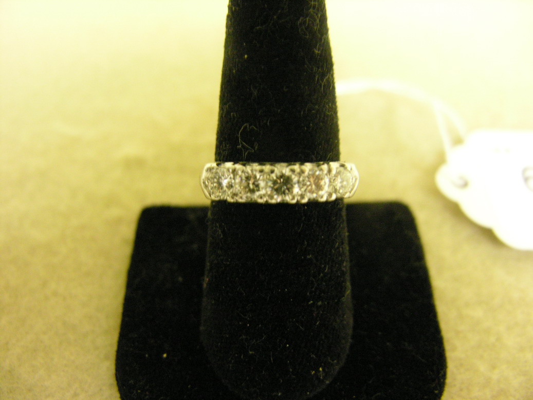 Appraisal: CT DIAMOND WEDDING BAND White gold band Five pt stones