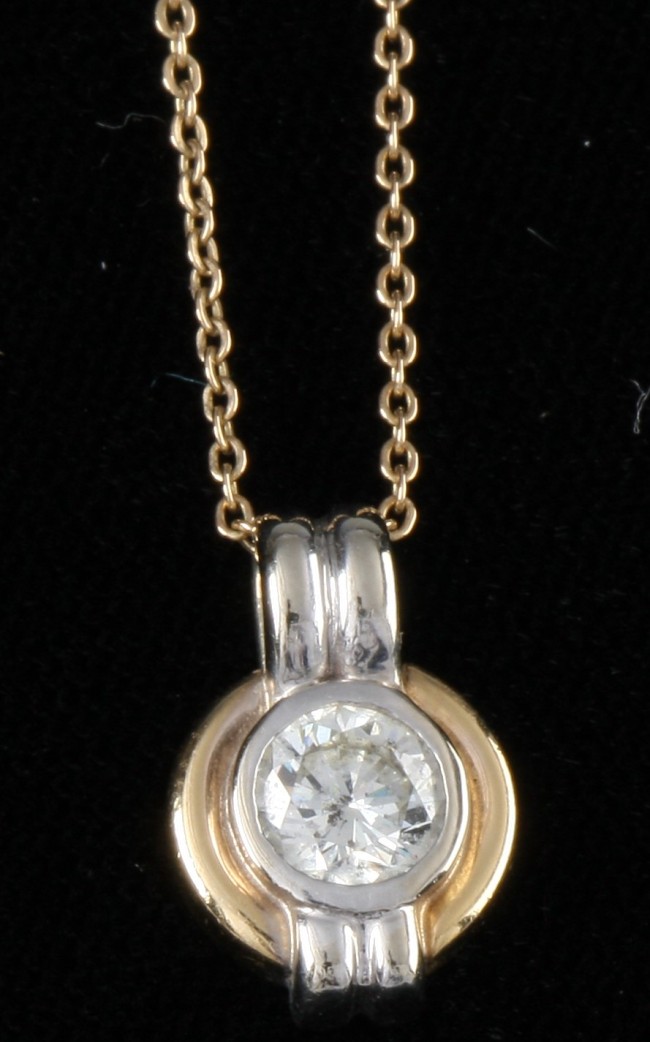 Appraisal: KTT and diamond pendant with one ct diamond cable chain