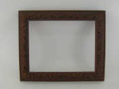 Appraisal: A large th century oak frame deeply hand carved with