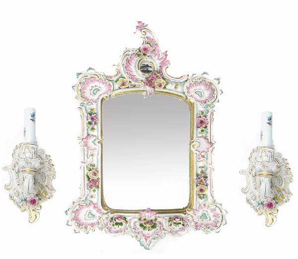 Appraisal: A Dresden porcelain mirror and a pair of wall sconces