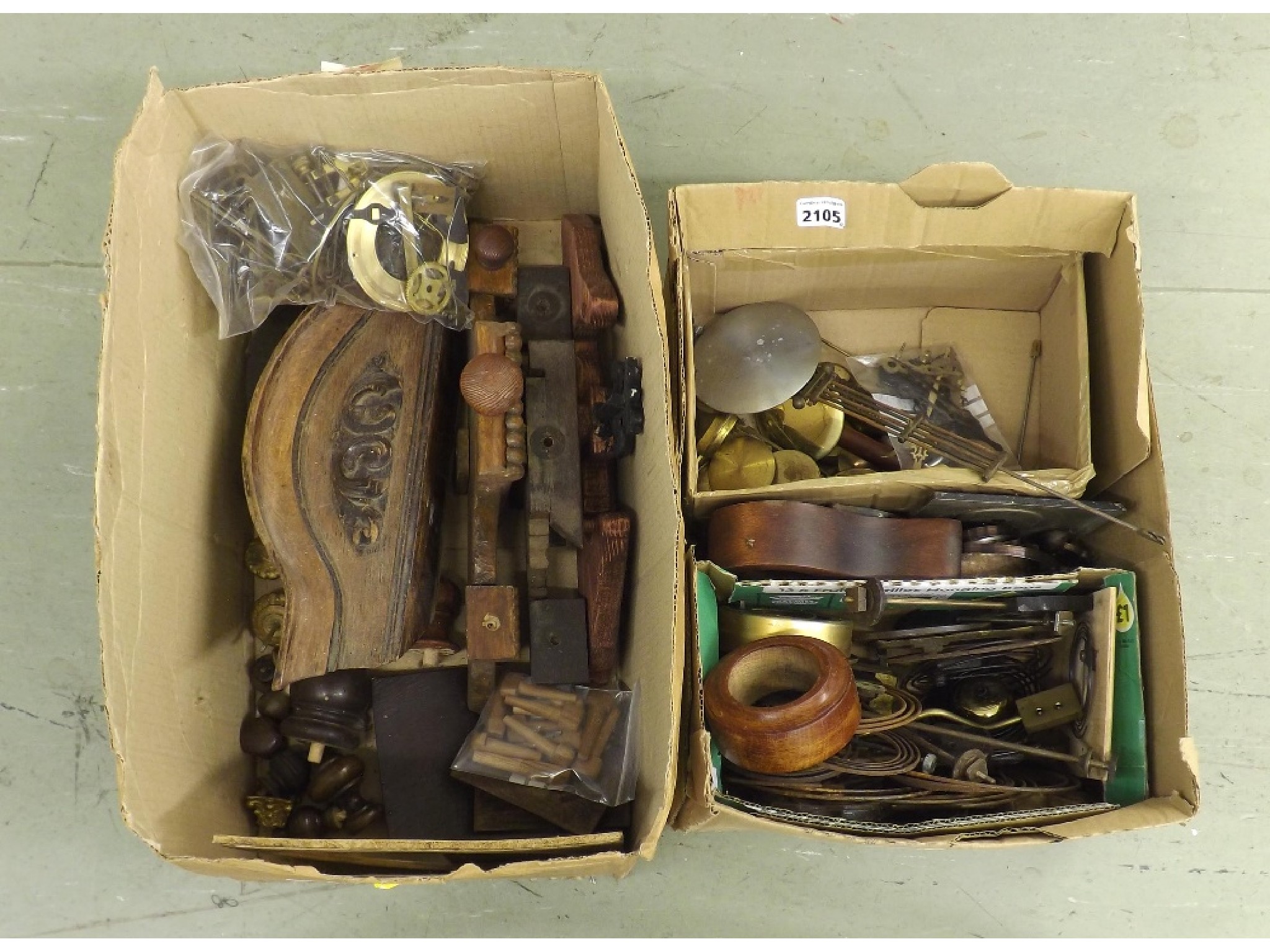 Appraisal: Two boxes of various clock fittings including case parts pendulums