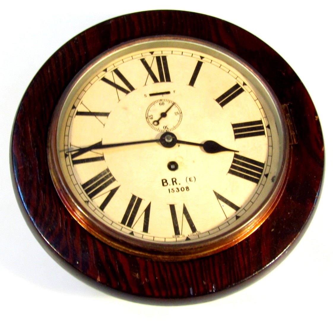 Appraisal: A late thC pine stained wall railway clock of small