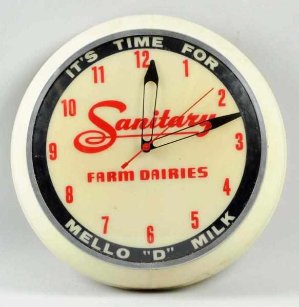 Appraisal: Sanitary Farm Dairies Lighted Clock s to s Displays well