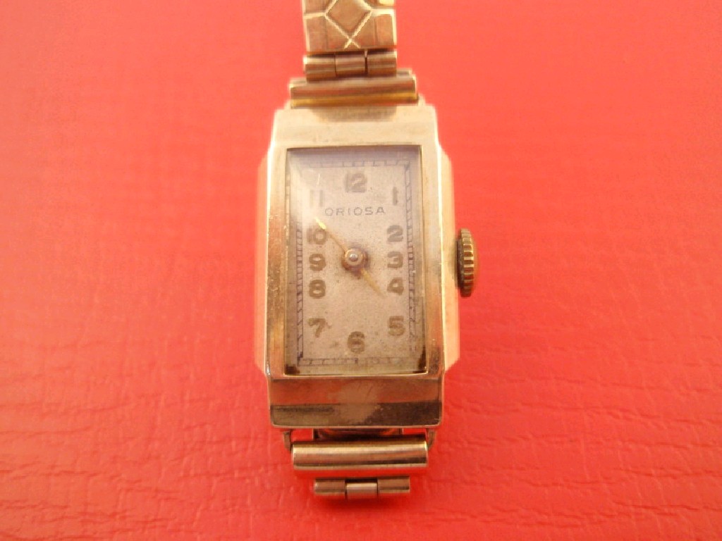 Appraisal: A ladies rectangular wristwatch by Oiosa on expanding bracelet