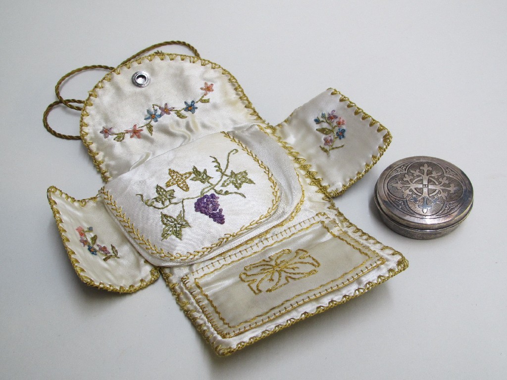 Appraisal: A silver pyx chased with a cross and To Fr