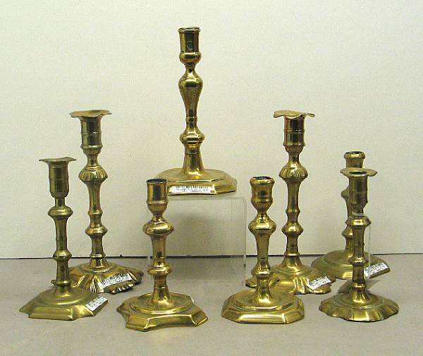 Appraisal: Thirteen English brass candlesticks th century Comprising two pairs and