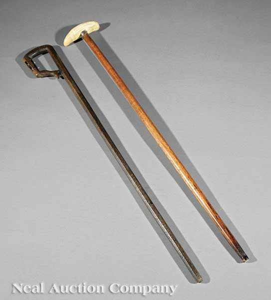 Appraisal: Two Antique Canes th c one with a whale tooth