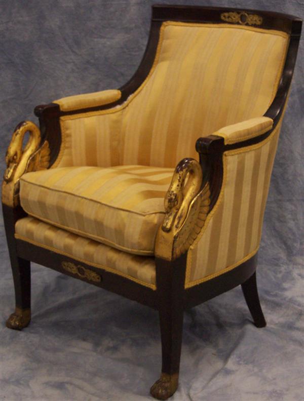 Appraisal: Swan carved French Empire mahogany armchair high Estimate -