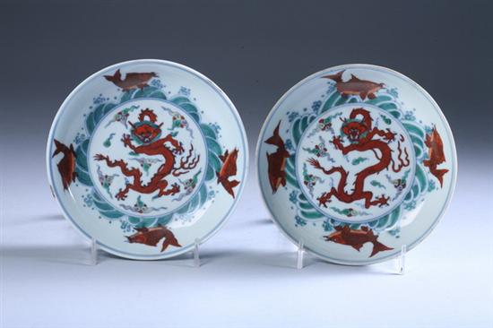 Appraisal: PAIR CHINESE DOUCAI PORCELAIN DRAGON SAUCERS Chenghua six-character underglazed blue