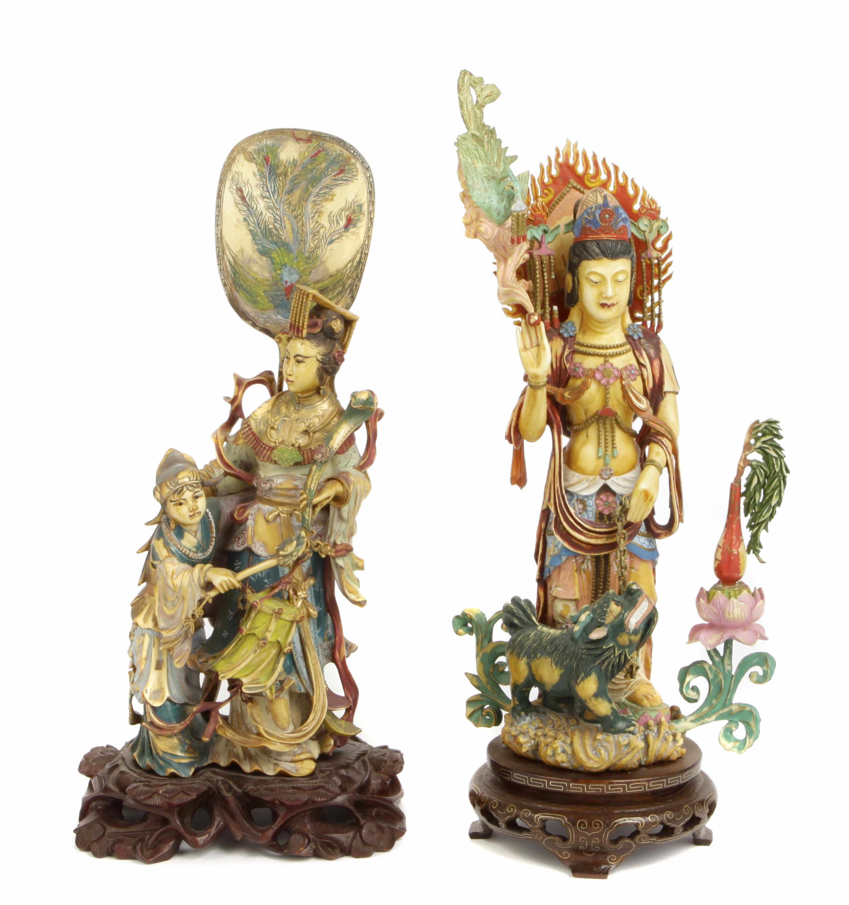 Appraisal: Asian Works of Art A pair of Chinese carved and