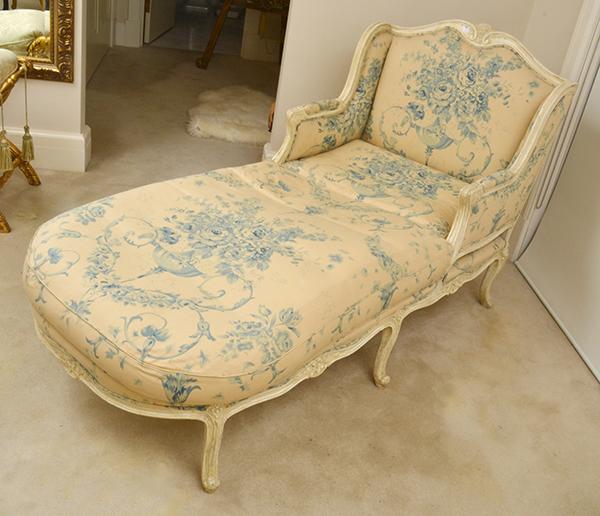 Appraisal: A LOUIS XV STYLE PAINTED AND UPHOLSTERED CHAISE BRISEE WITH