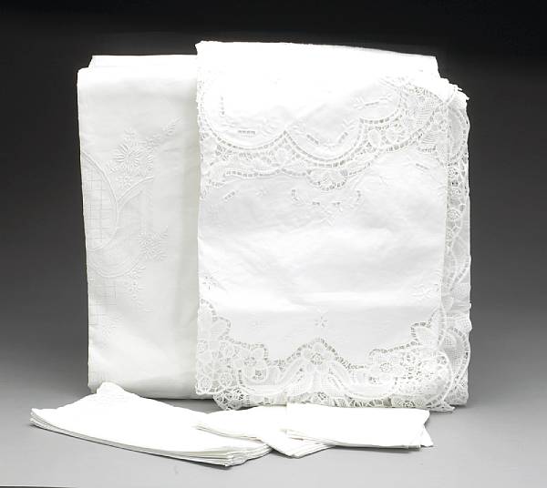 Appraisal: Two square white linen and lace table clothes with matching