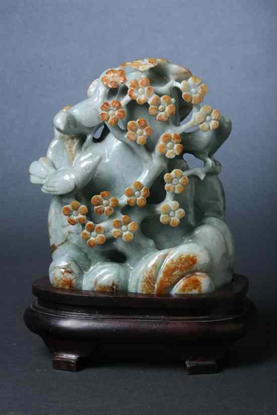 Appraisal: CHINESE JADEITE CARVING Carved in high relief to depict birds