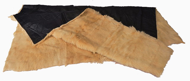 Appraisal: A CANADIAN CREAM FUR BED COVER backed with black silk