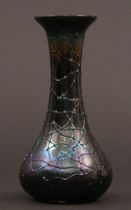 Appraisal: Iridescent Glass Vase Iridescent glass vase has a plum colored